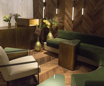 Imageová fotka prostoru Vermont Lounge, křesílka, konferenční stolek